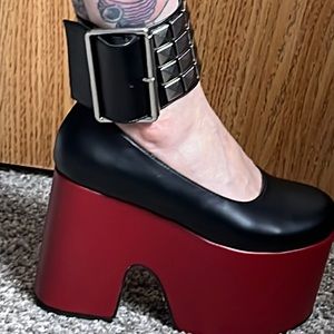 Platform slip on shoe with an ankle buckle. Big platform!